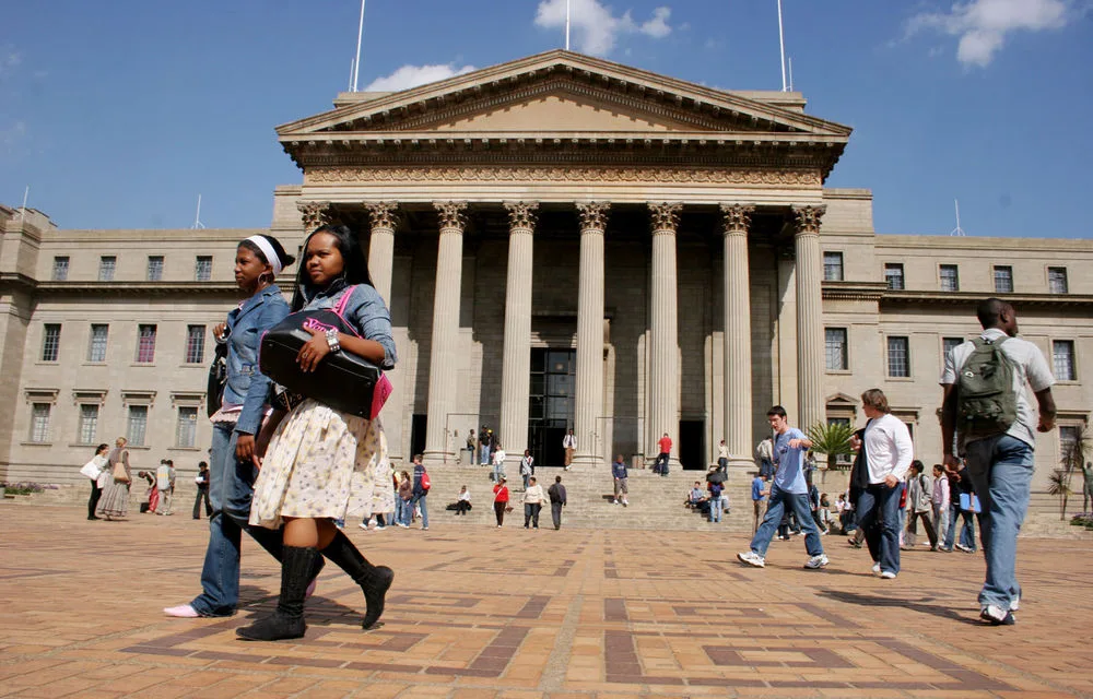 Students walking across a South African university campus